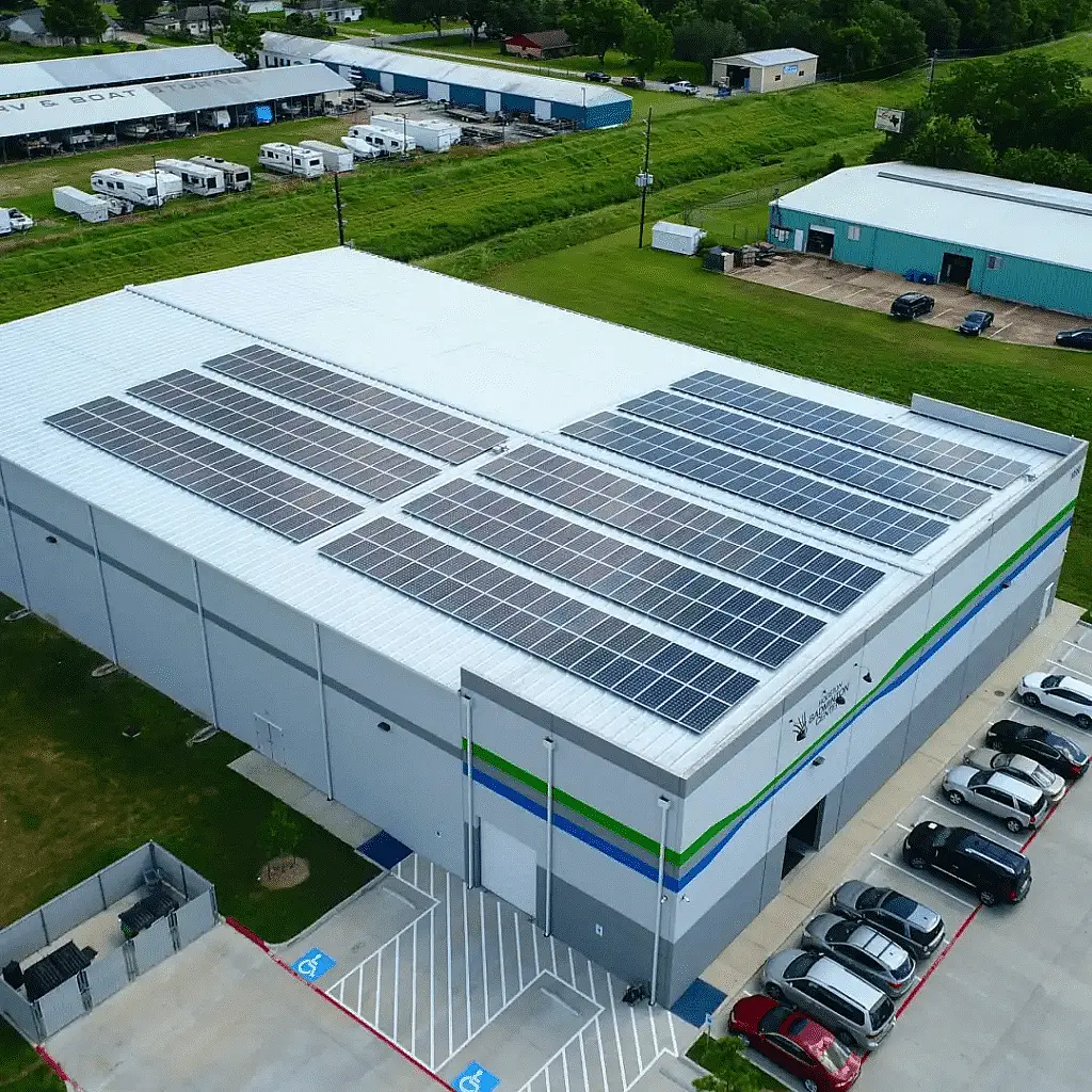 Building with solar panels on the roof.